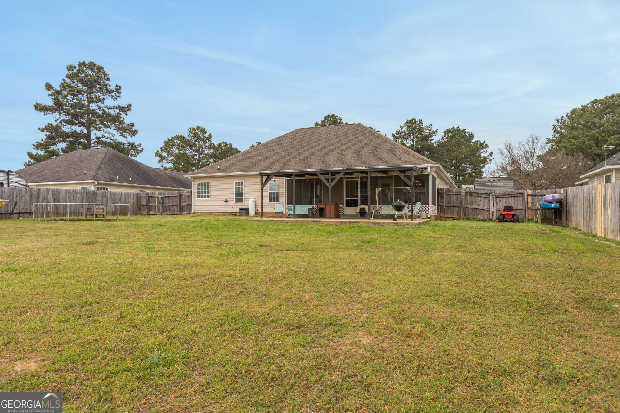 105 Galloway Street Kathleen, GA 31047 - Photo 3 of 35 a front view of house with yard and swimming pool
