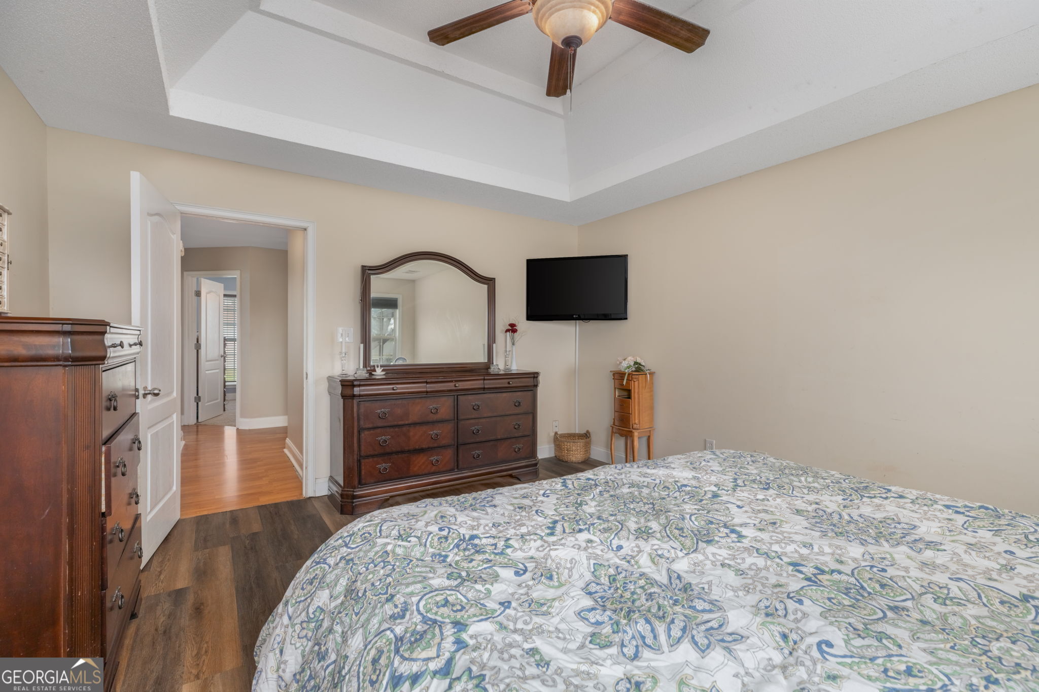 105 Galloway Street Kathleen, GA 31047 - Photo 31 of 35 a bedroom with a bed and a flat screen tv