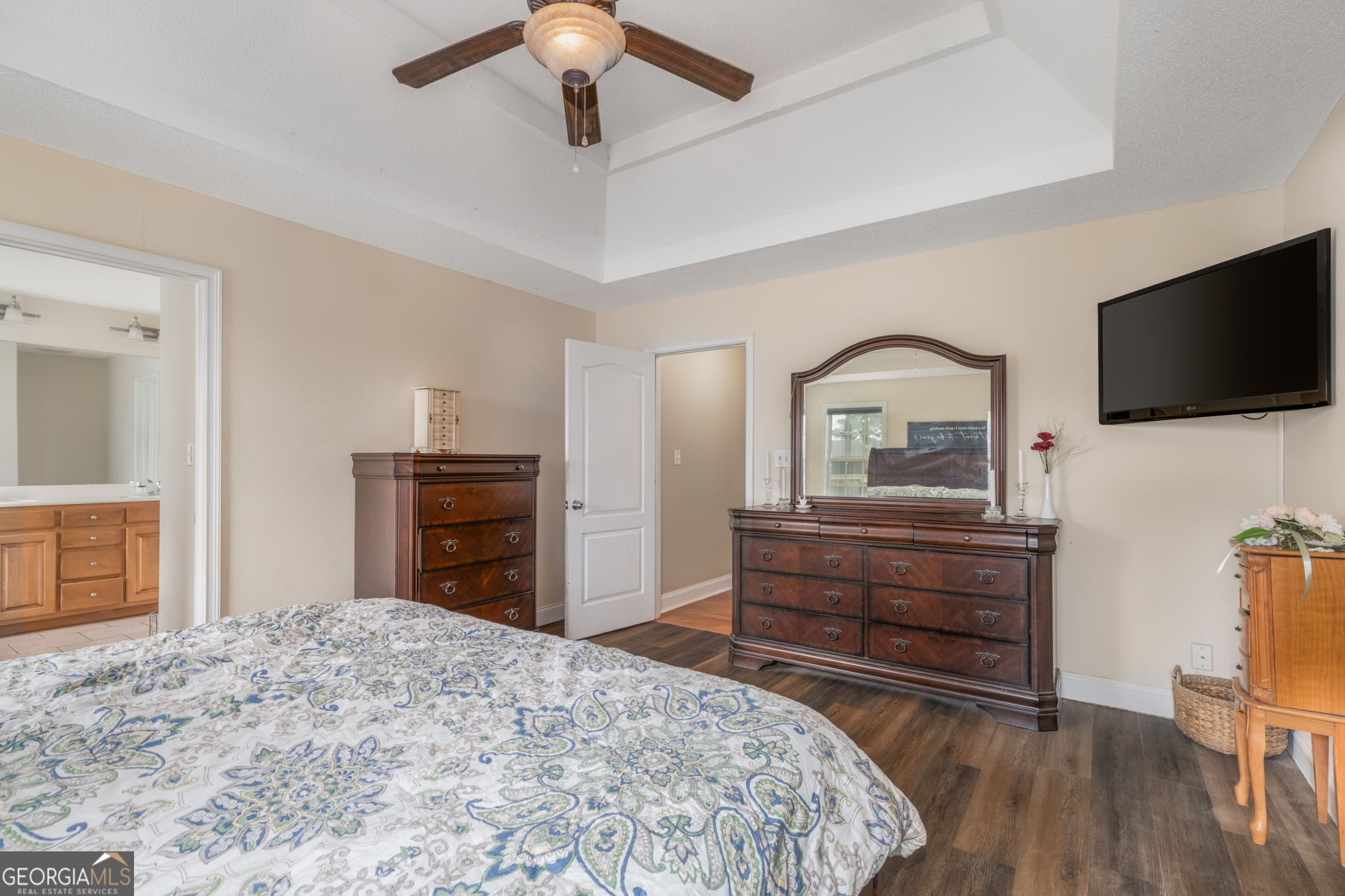 105 Galloway Street Kathleen, GA 31047 - Photo 33 of 35 a bedroom with a bed and a flat screen tv