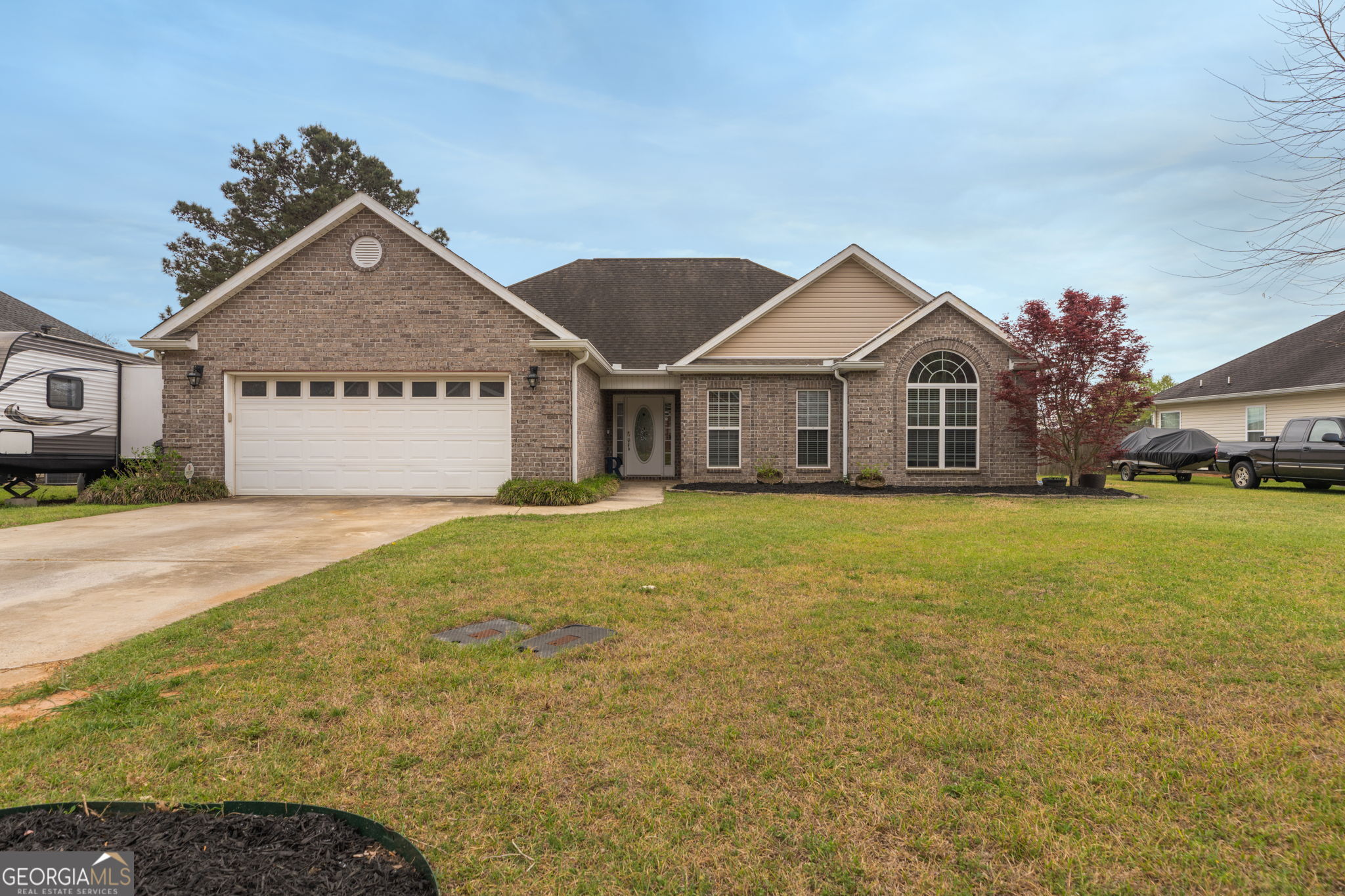 105 Galloway Street Kathleen, GA 31047 - Photo 4 of 35 a view of a house with a outdoor space