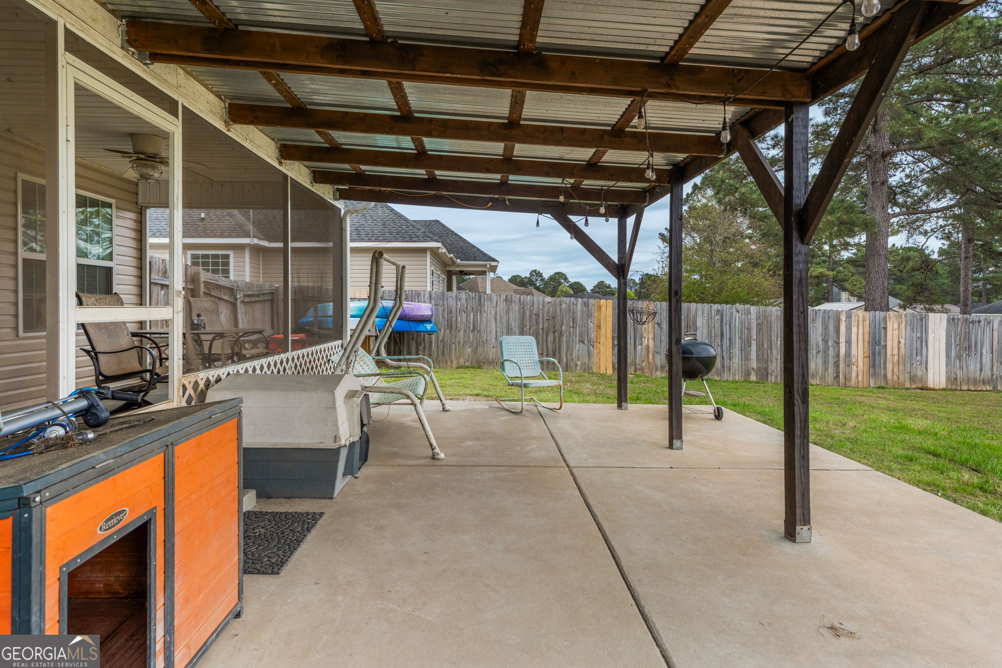 105 Galloway Street Kathleen, GA 31047 - Photo 5 of 35 a view of a porch with furniture
