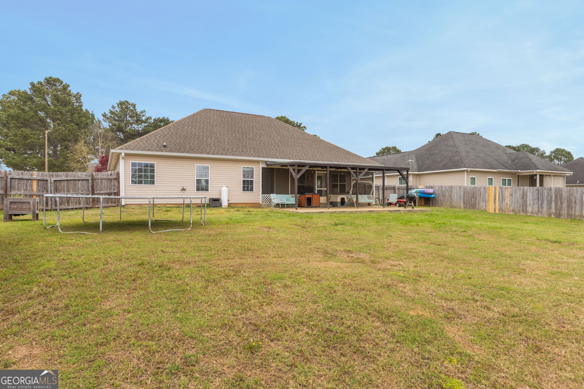 105 Galloway Street Kathleen, GA 31047 - Photo 6 of 35 a front view of a house with swimming pool