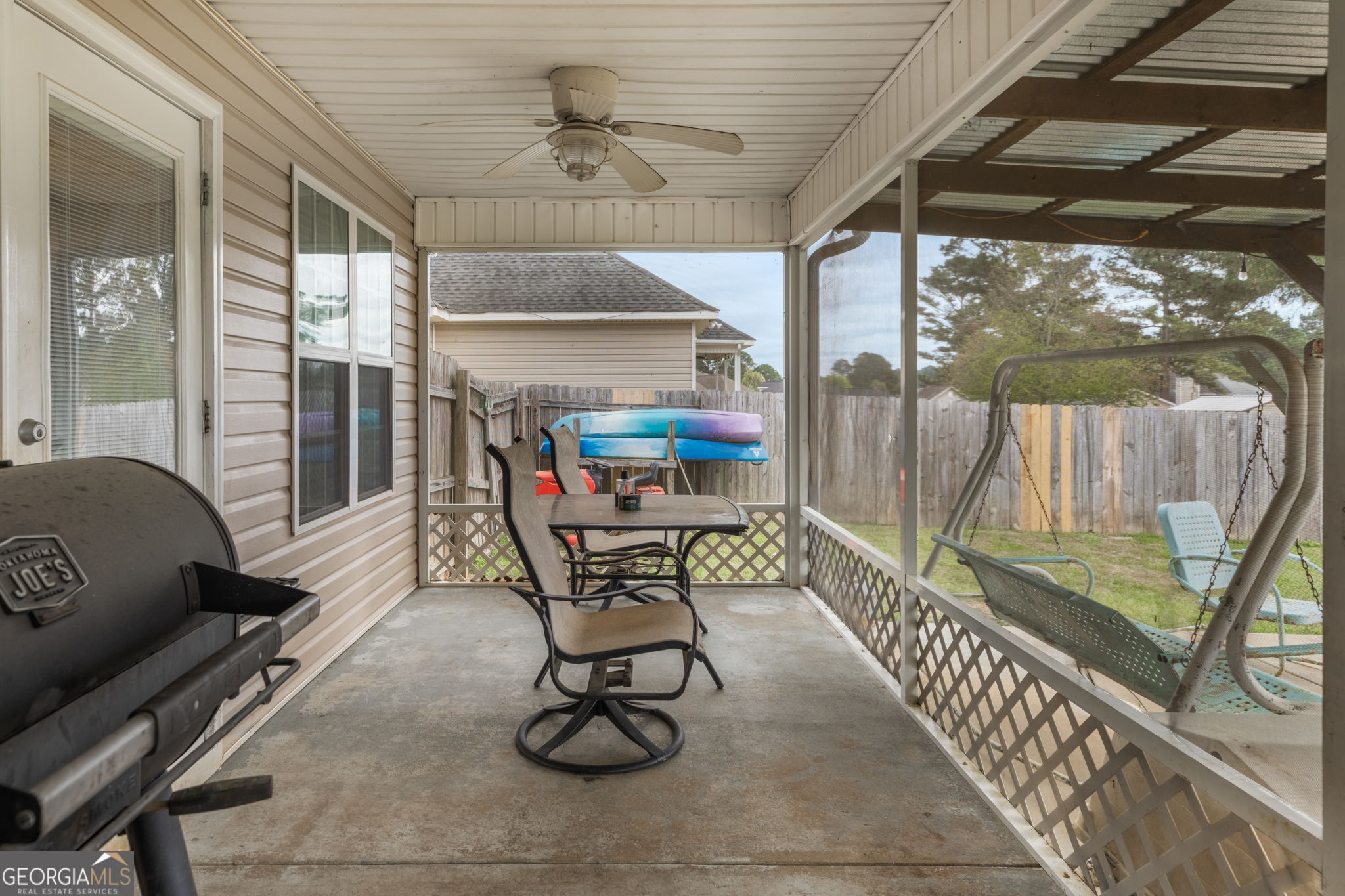 105 Galloway Street Kathleen, GA 31047 - Photo 7 of 35 a living room with patio furniture