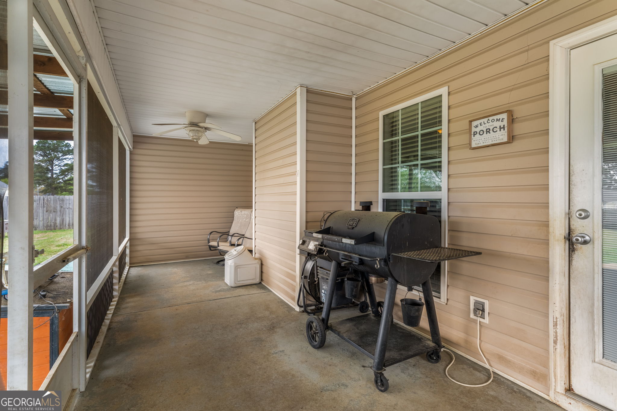 105 Galloway Street Kathleen, GA 31047 - Photo 10 of 35 a view of a workspace with furniture and a window
