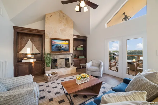 a kitchen with a sink a stove and cabinets