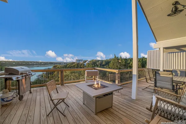 a view of a roof deck with couches