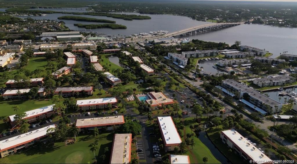1909 Southwest Palm City Road, Unit D Stuart, FL 34994 - Photo 17 of 19 an aerial view of a city