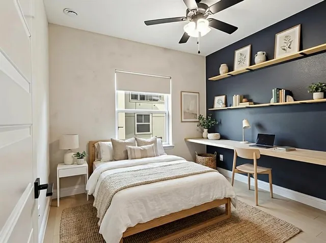 a bedroom with a bed and a bookshelf with wooden floor