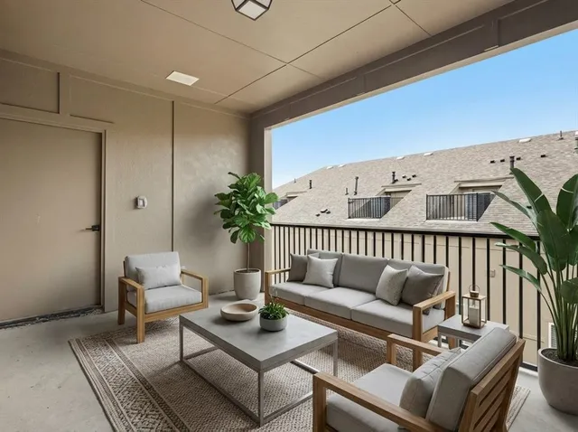 front view of a brick house with a yard