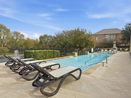 a view of a backyard with a patio