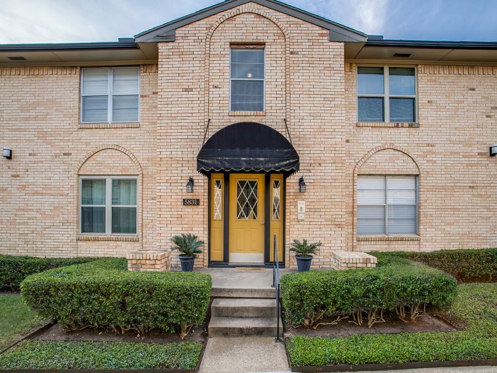 5831 Sandhurst Lane, Unit B Dallas, TX 75206 - Photo 1 of 1 a front view of a house with a yard