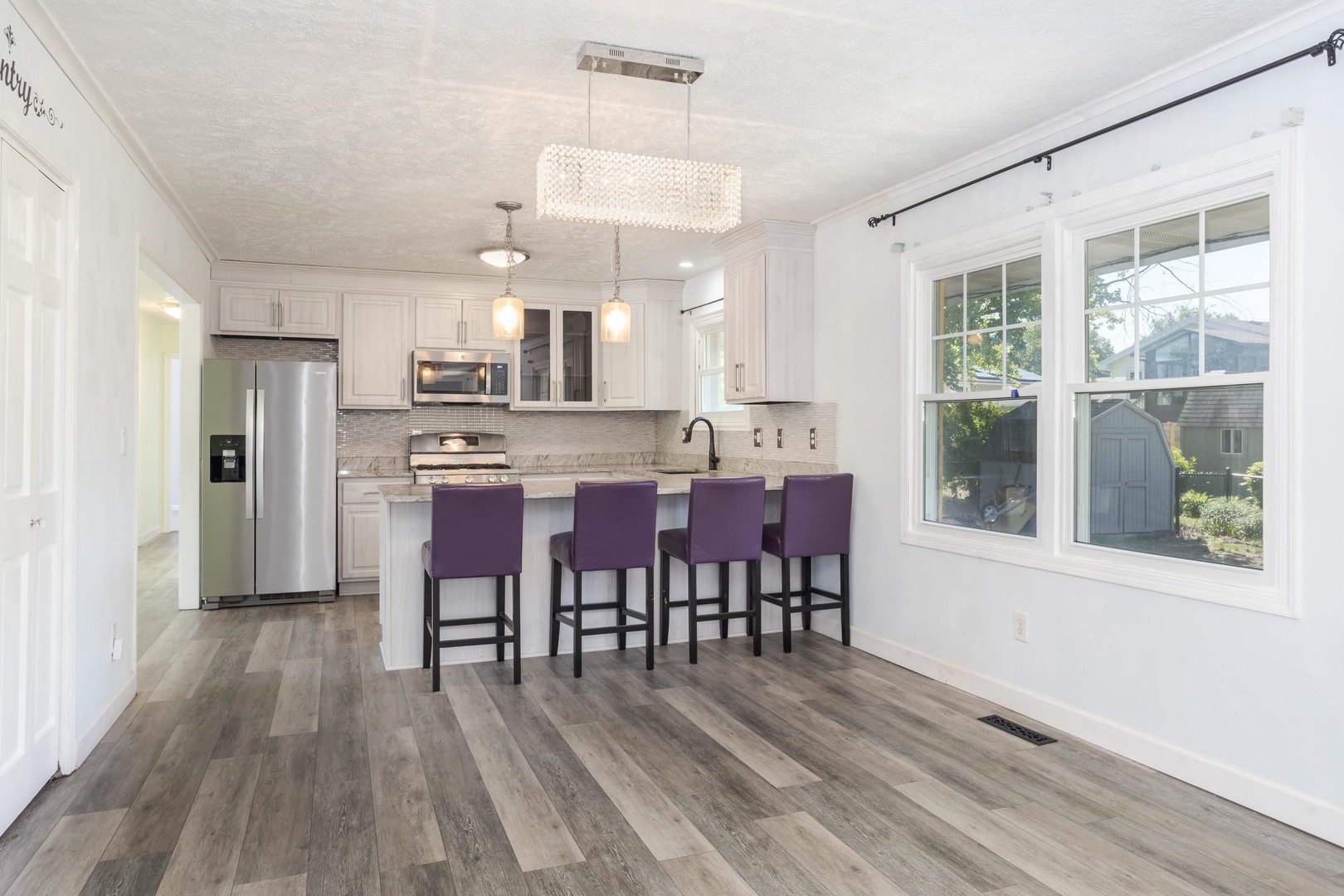 1717 Cook Drive Normal, IL 61761 - Photo 15 of 55 a view of a dining room with furniture window and wooden floor