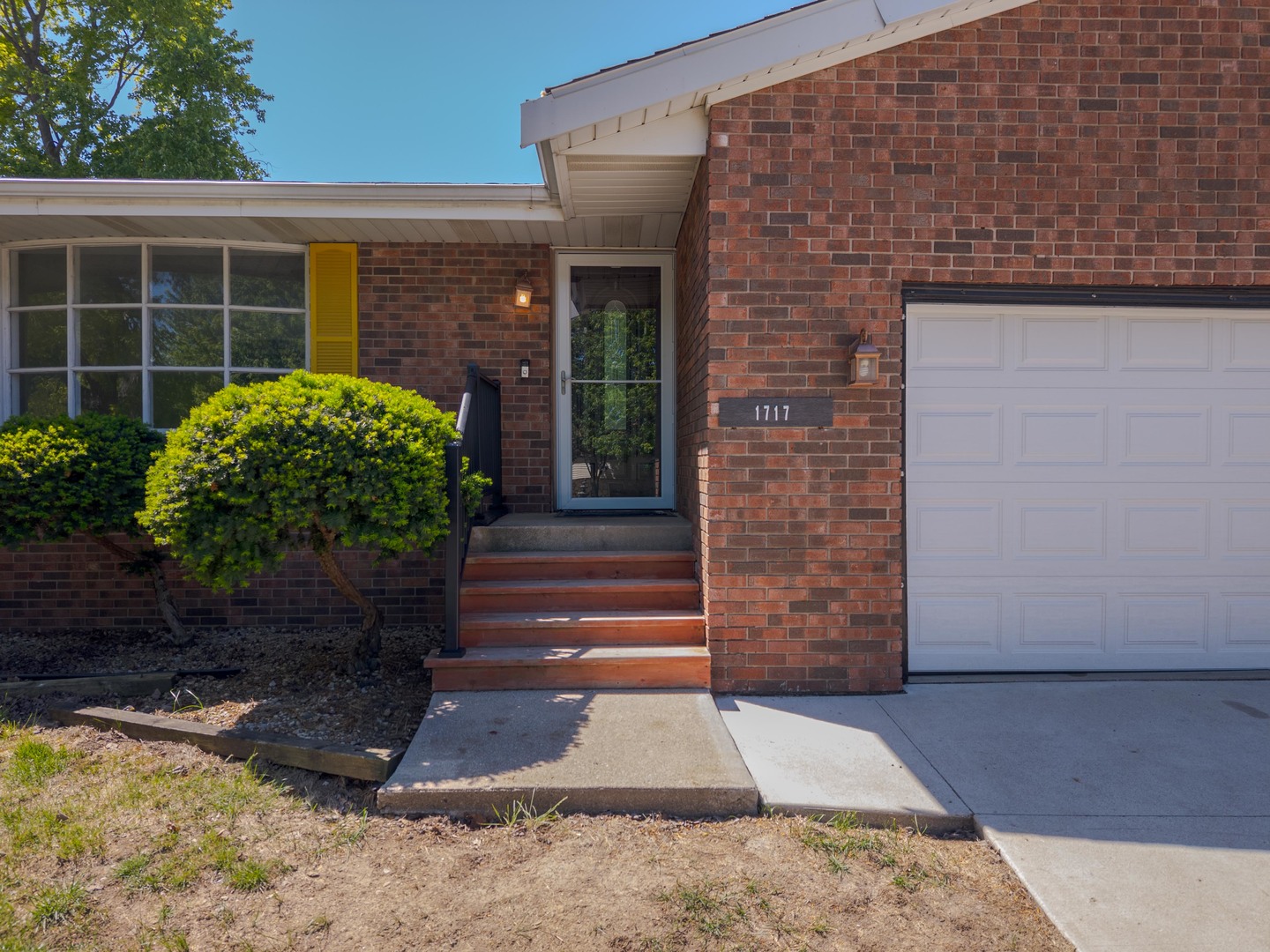 1717 Cook Drive Normal, IL 61761 - Photo 2 of 55 a front view of a house