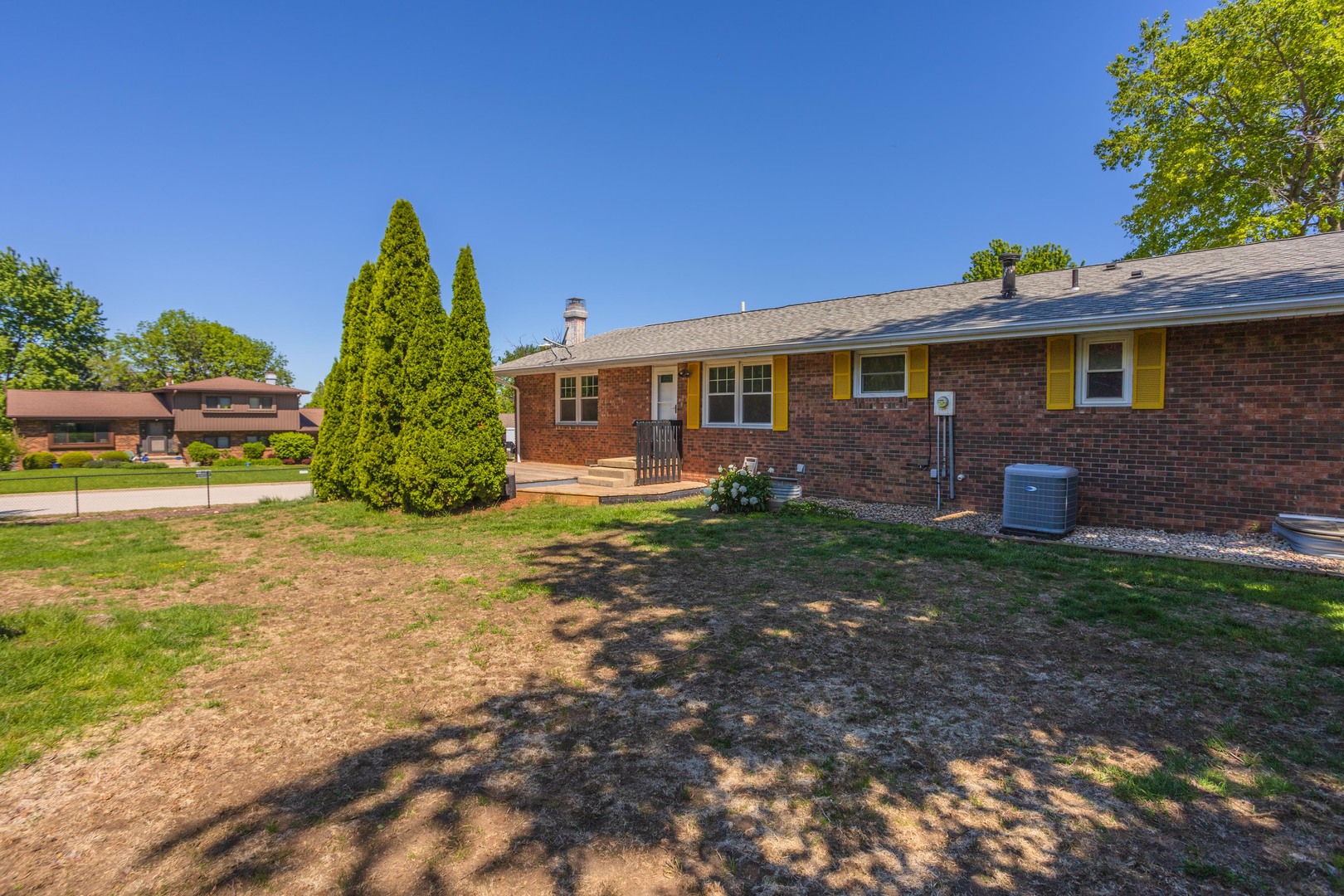 1717 Cook Drive Normal, IL 61761 - Photo 44 of 55 a front view of a house with garden