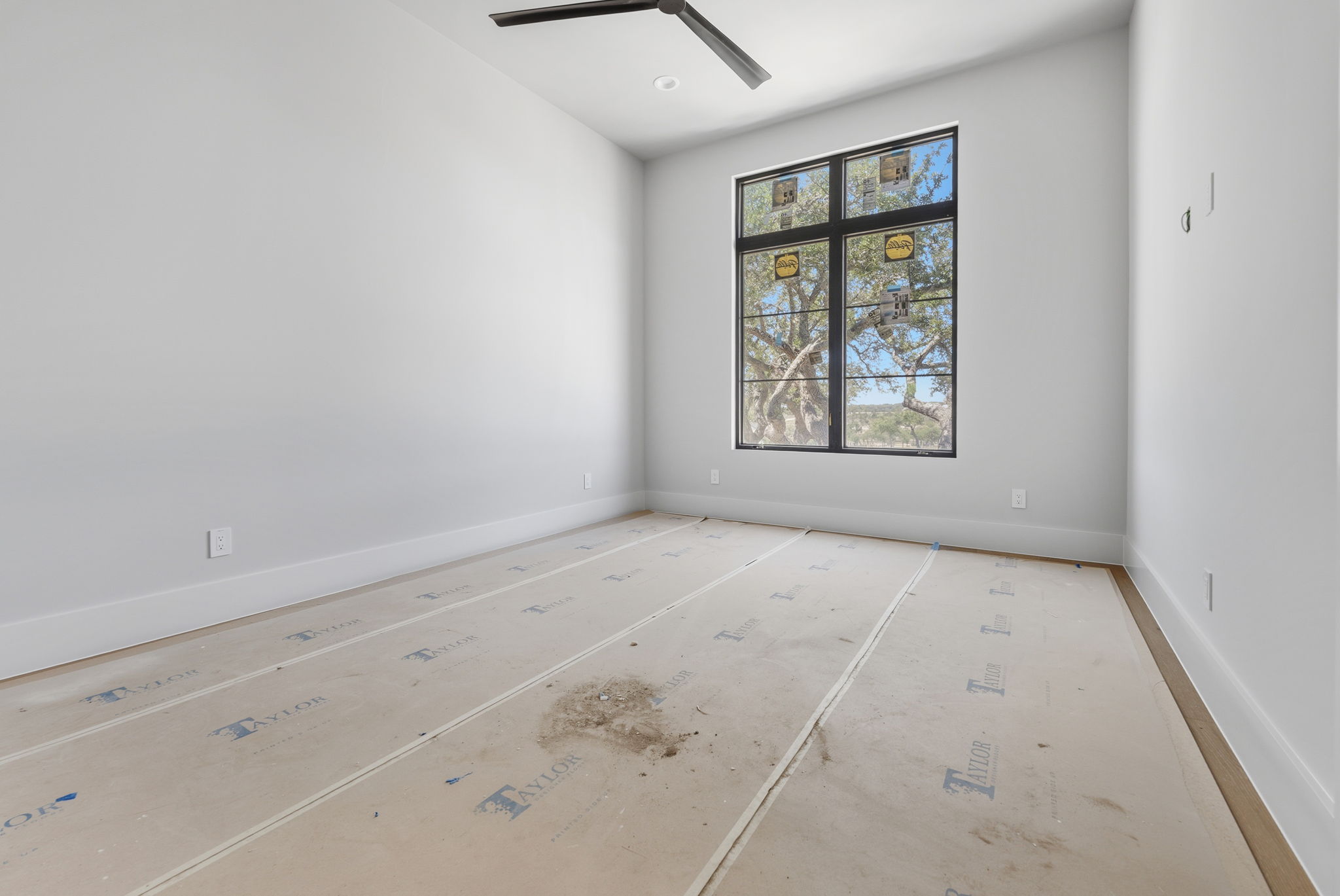 3300 Rm -165 Dripping Springs Dripping Springs, TX 78620 - Photo 23 of 32 an empty room with windows