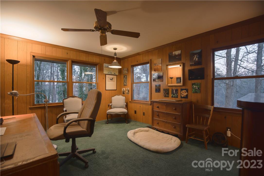 205 Hooper Creek Road Tryon, NC 28782 - Photo 39 of 45 a room with furniture a rug and windows