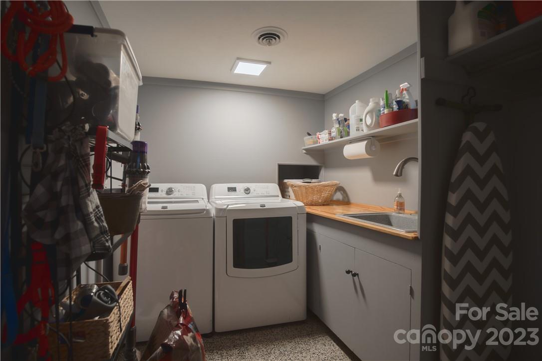 205 Hooper Creek Road Tryon, NC 28782 - Photo 43 of 45 a utility room with dryer and washer