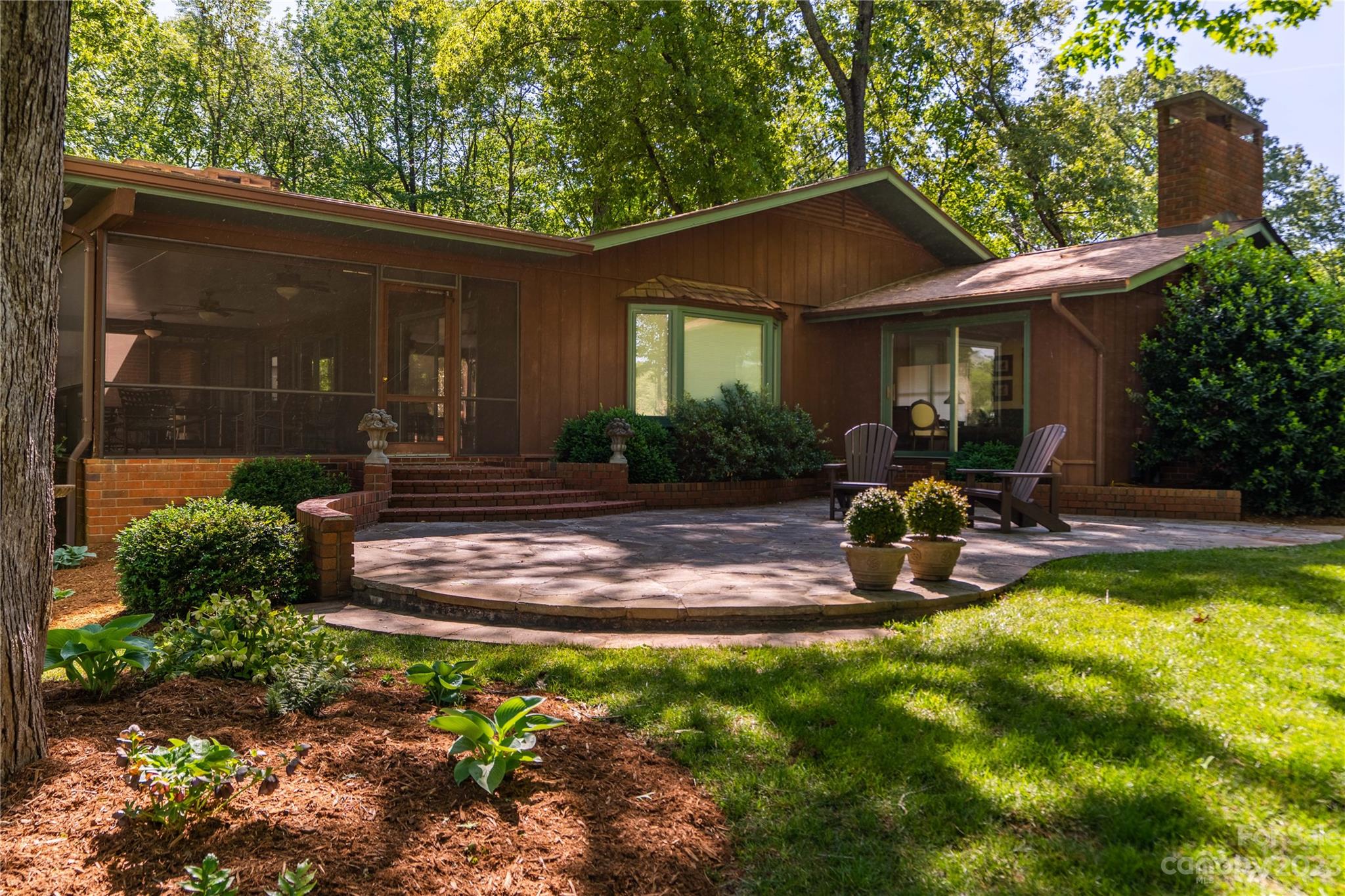 205 Hooper Creek Road Tryon, NC 28782 - Photo 5 of 45 a view of a house with backyard