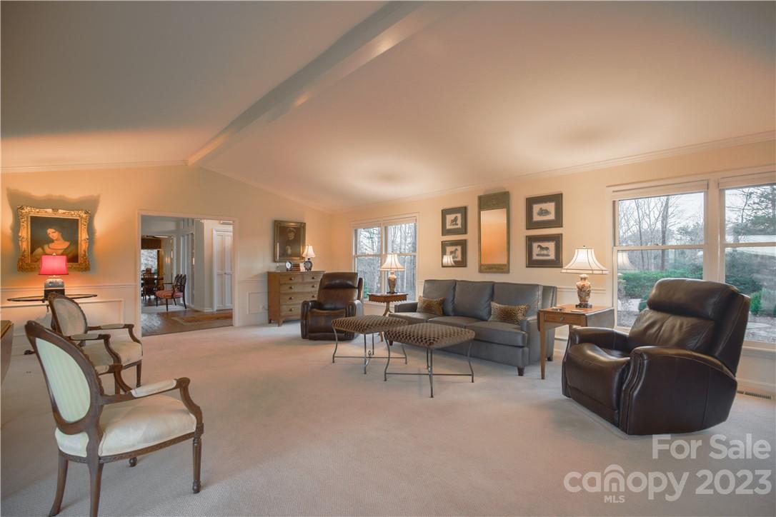 205 Hooper Creek Road Tryon, NC 28782 - Photo 9 of 45 a living room with furniture and large windows