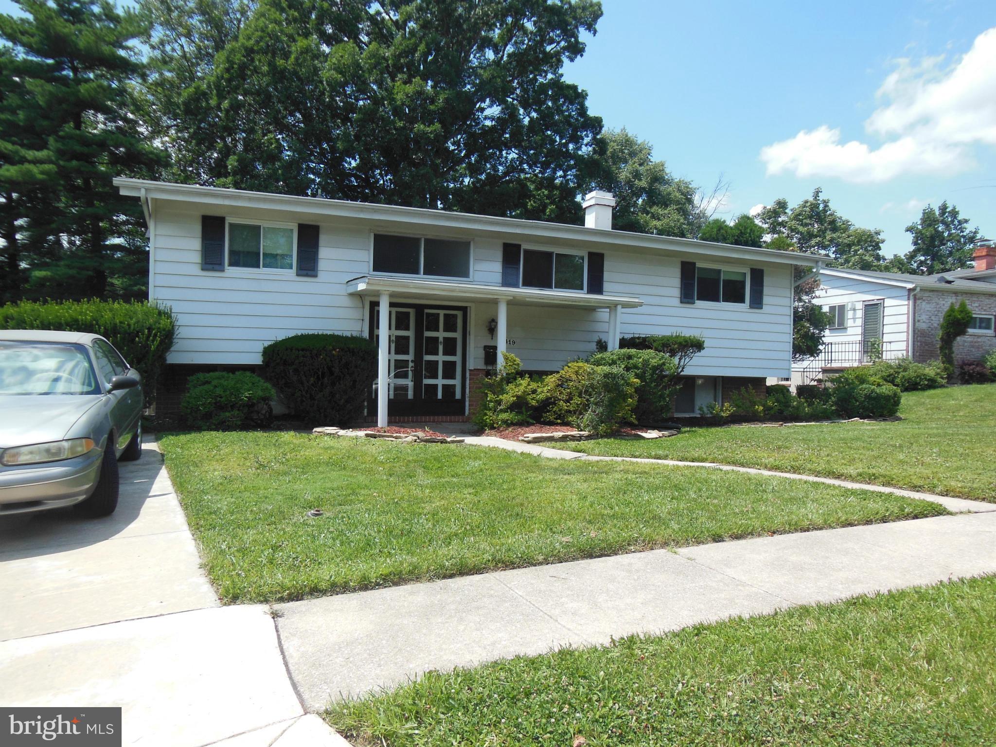 7419 Prince George Road Baltimore, MD 21208 - Photo 2 of 19 a view of a house with a yard