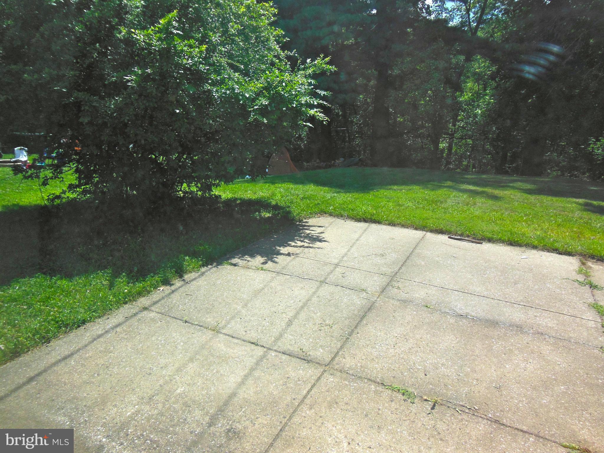 7419 Prince George Road Baltimore, MD 21208 - Photo 5 of 19 a view of a pathway with a yard
