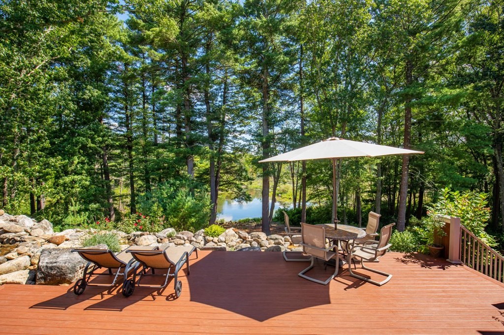 49 Wilsondale Street Dover, MA 02030 - Photo 20 of 22 a view of backyard with outdoor seating and trees