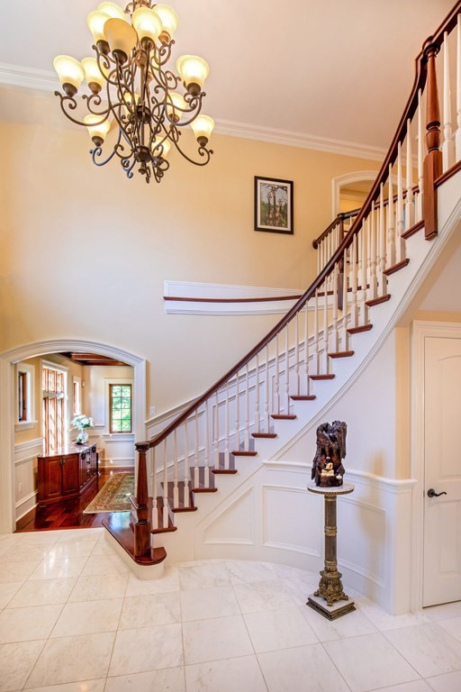 49 Wilsondale Street Dover, MA 02030 - Photo 4 of 22 a view of entryway and hall with a chandelier