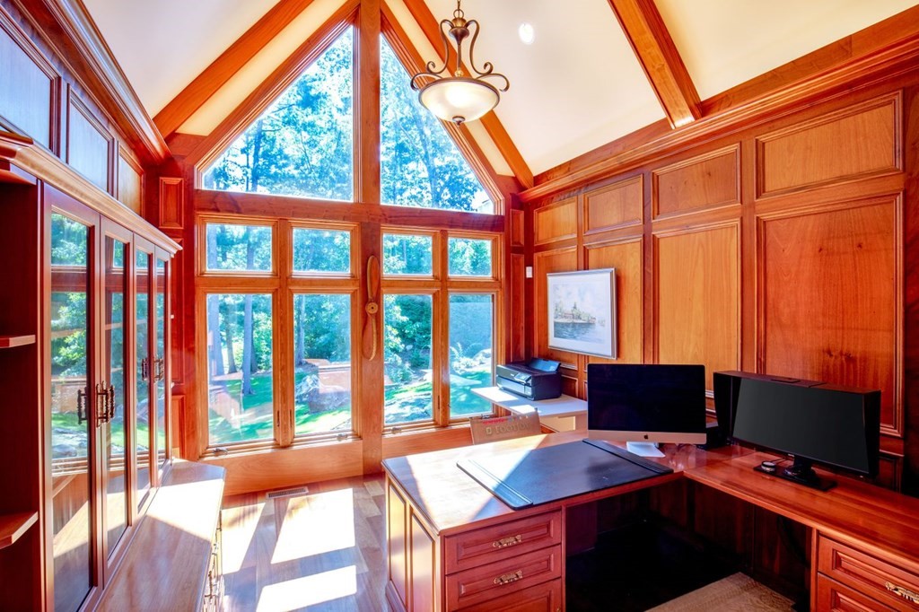 49 Wilsondale Street Dover, MA 02030 - Photo 8 of 22 a workstation with a large desk next to a large window