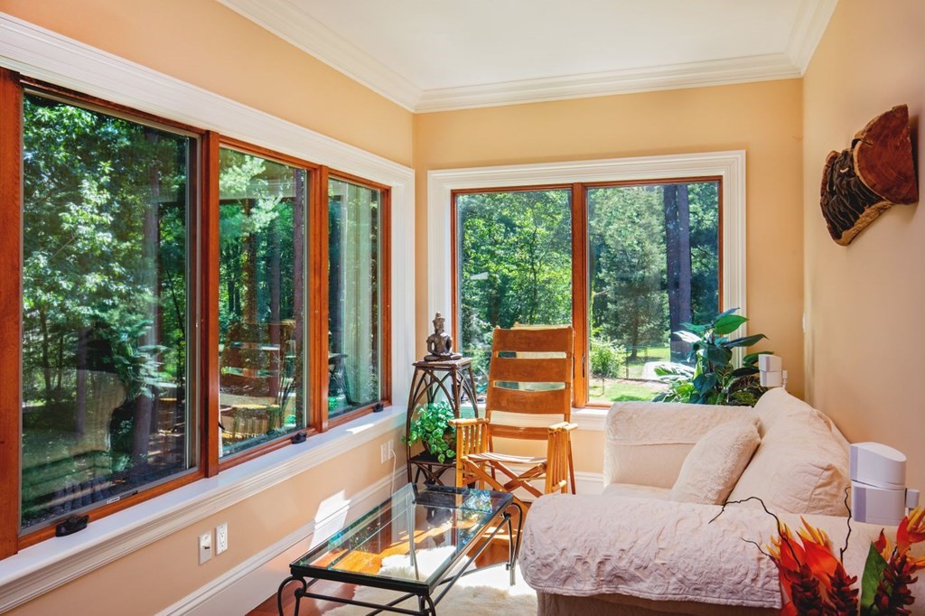 49 Wilsondale Street Dover, MA 02030 - Photo 9 of 22 a living room with furniture and a floor to ceiling window