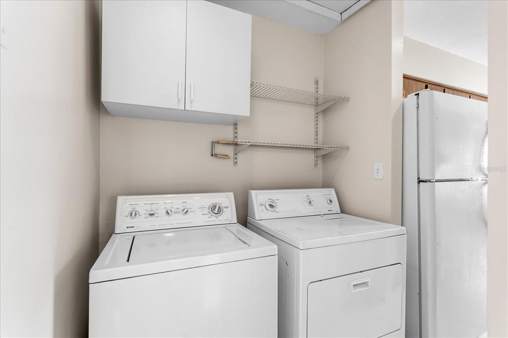 2786 Curry Ford Road, Unit 6B Orlando, FL 32806 - Photo 15 of 27 a utility room with dryer and washer