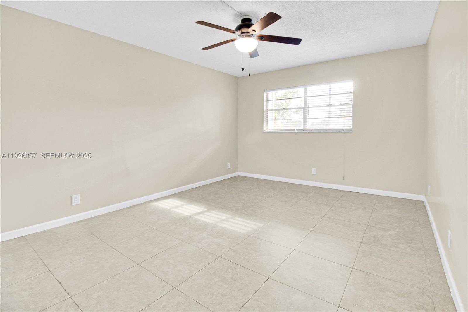 6505 Winfield Boulevard, Unit B4 Margate, FL 33063 - Photo 15 of 25 a view of an empty room with a window