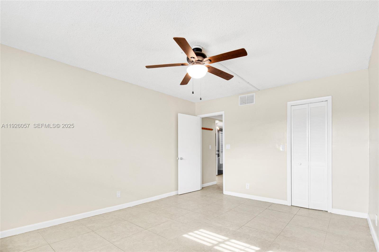 6505 Winfield Boulevard, Unit B4 Margate, FL 33063 - Photo 17 of 25 a view of an empty room