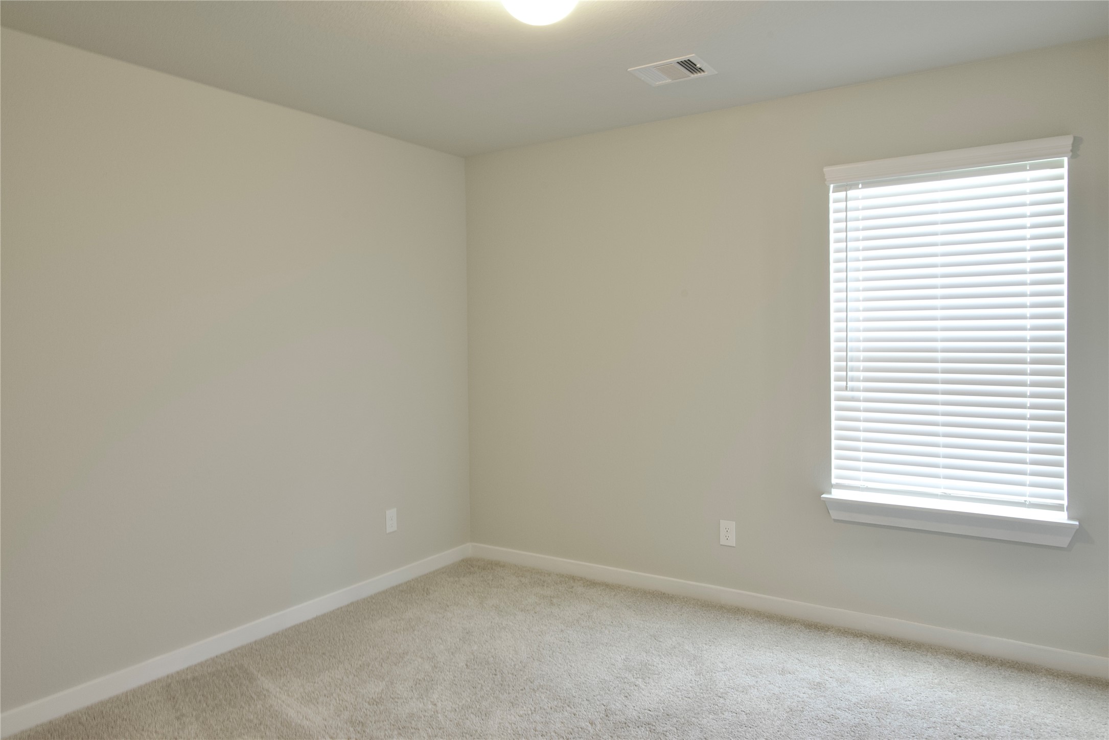 3207 Tilley Drive Rosenberg, TX 77471 - Photo 31 of 43 an empty room with a window