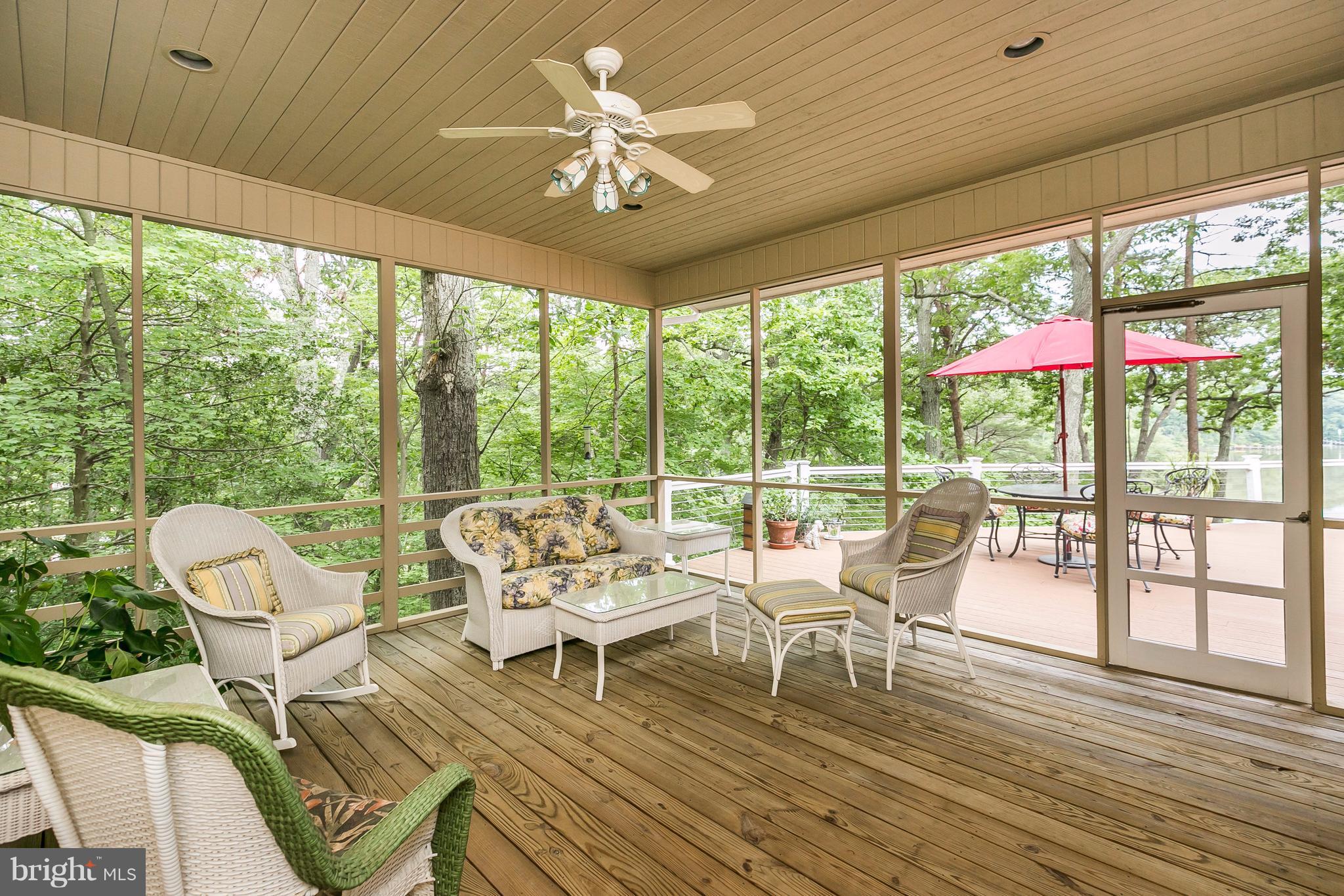 133 Claiborne Road Edgewater, MD 21037 - Photo 14 of 30 Spacious Screened Porch for shady cover