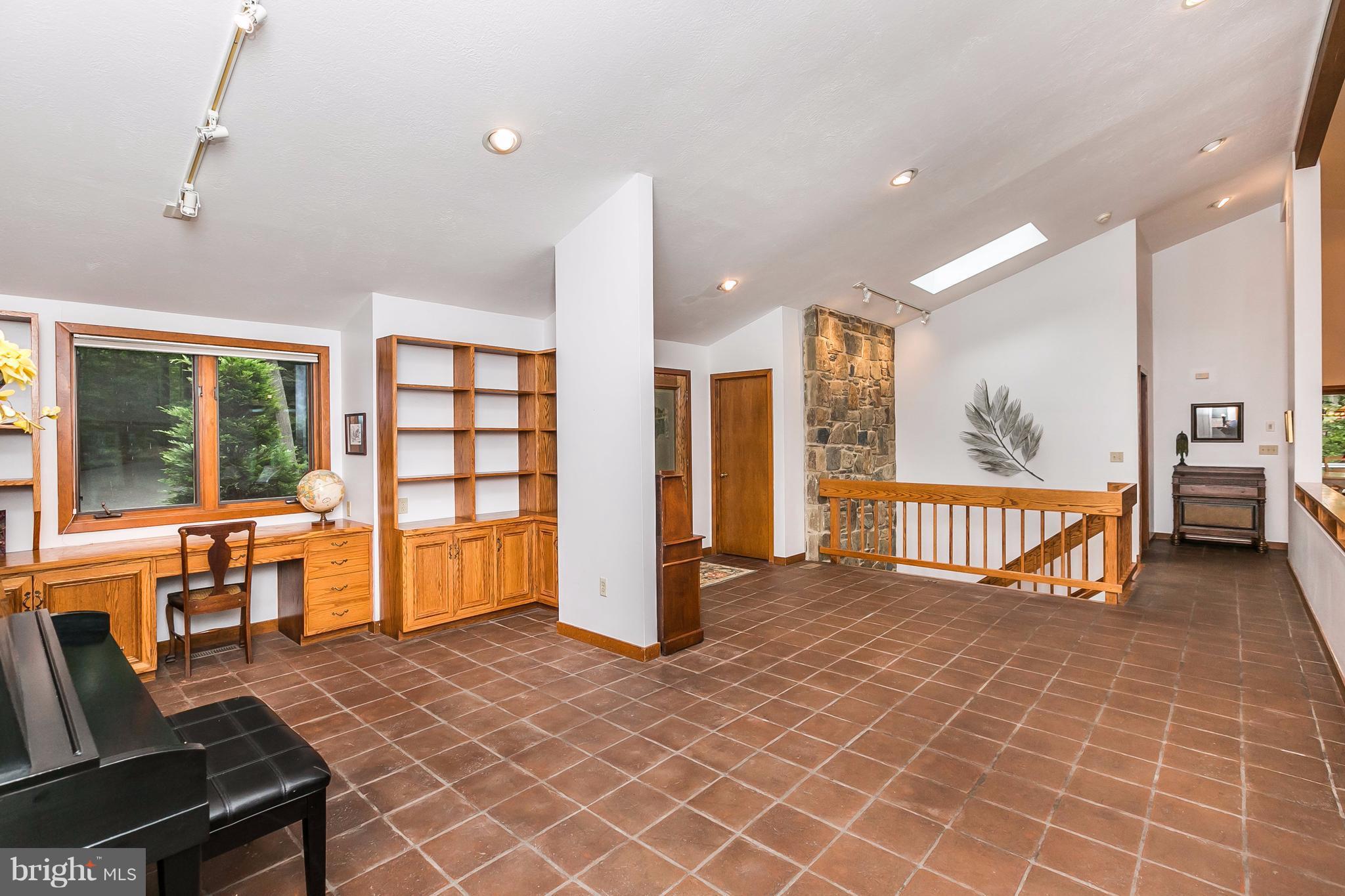 133 Claiborne Road Edgewater, MD 21037 - Photo 8 of 30 Peruvian tile Foyer with Library alcove