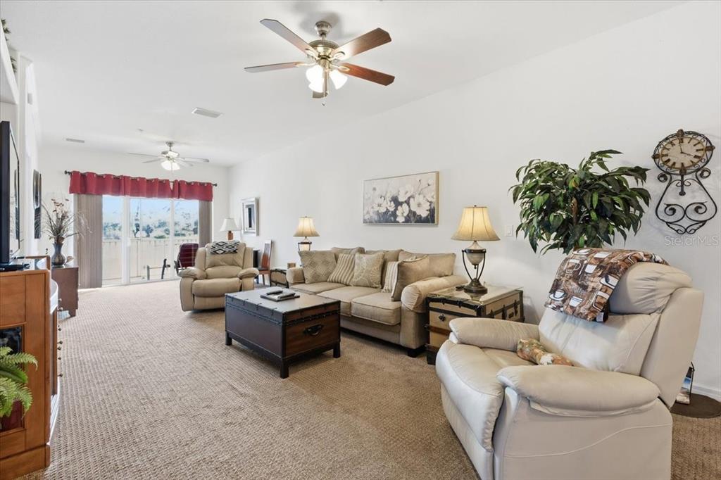 102 Natures Way, Unit 2101 Rotonda West, FL 33947 - Photo 18 of 49 a living room with furniture