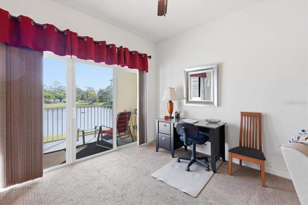 102 Natures Way, Unit 2101 Rotonda West, FL 33947 - Photo 21 of 49 a view of a workspace with furniture and a window