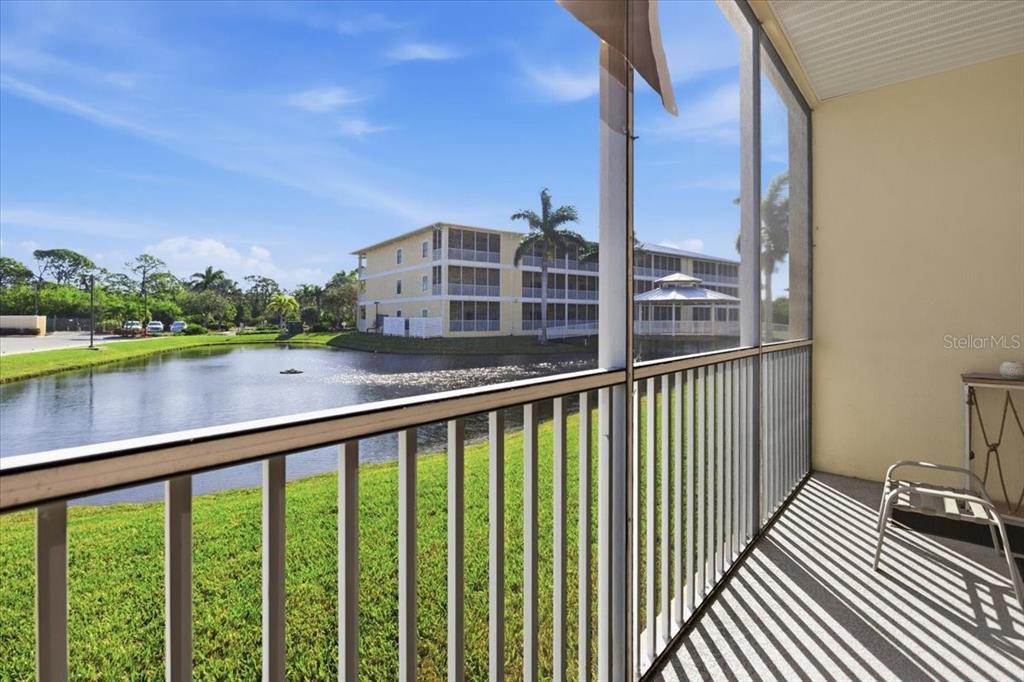 102 Natures Way, Unit 2101 Rotonda West, FL 33947 - Photo 34 of 49 a view of a balcony with lake view