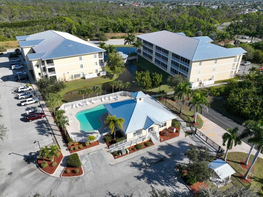 102 Natures Way, Unit 2101 Rotonda West, FL 33947 - Photo 44 of 49 an aerial view of a house with outdoor space
