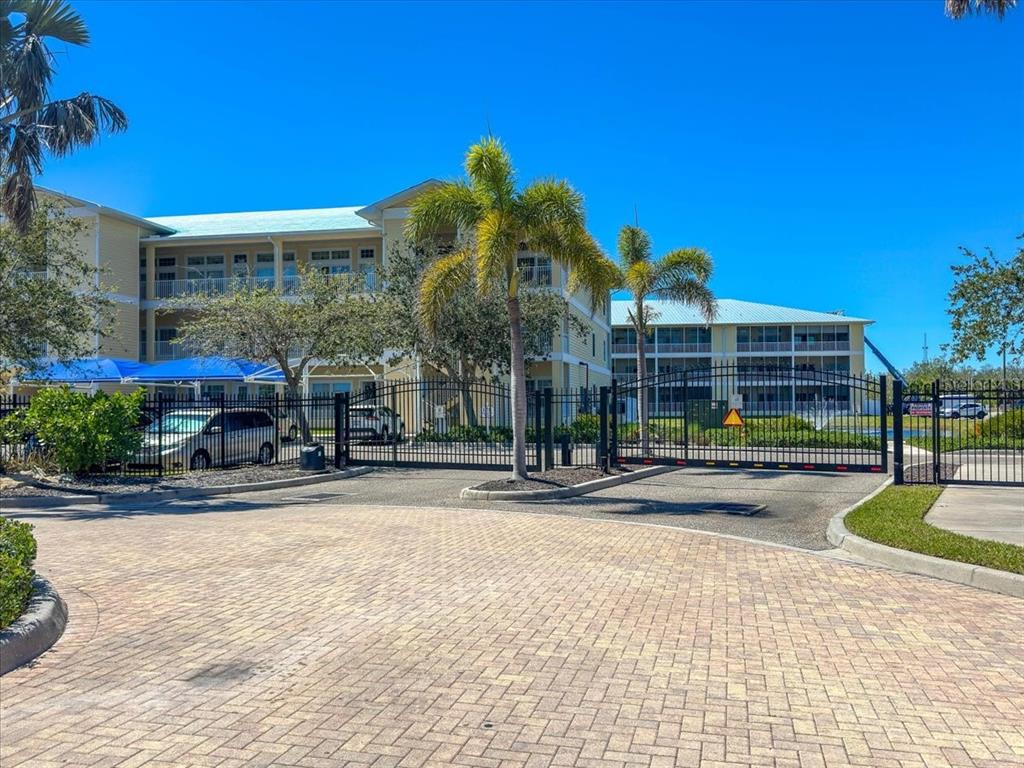 102 Natures Way, Unit 2101 Rotonda West, FL 33947 - Photo 47 of 49 a view of a building with street view