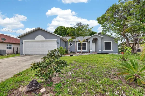 $460,000 | 3936 Southwest Jarmer Road, Port St. Lucie, FL 34953