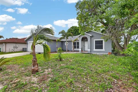$460,000 | 3936 Southwest Jarmer Road, Port St. Lucie, FL 34953
