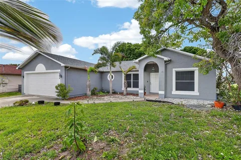 $460,000 | 3936 Southwest Jarmer Road, Port St. Lucie, FL 34953