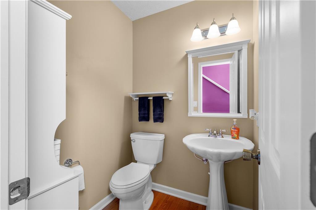 136 Maclaine Drive Carnegie, PA 15106 - Photo 11 of 30 a bathroom with a toilet sink and mirror