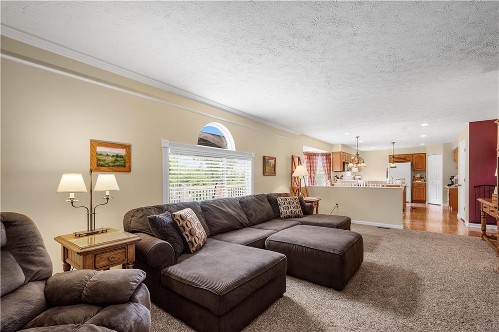 136 Maclaine Drive Carnegie, PA 15106 - Photo 17 of 30 a living room with furniture and a large window