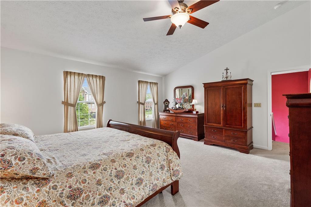 136 Maclaine Drive Carnegie, PA 15106 - Photo 20 of 30 a bedroom with a bed and a dresser