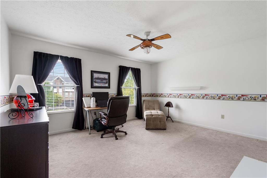 136 Maclaine Drive Carnegie, PA 15106 - Photo 24 of 30 a view of a workspace with furniture and a window