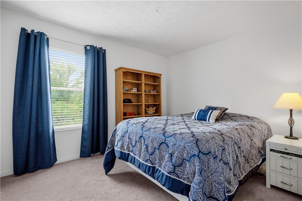 136 Maclaine Drive Carnegie, PA 15106 - Photo 25 of 30 a bedroom with a bed and a window