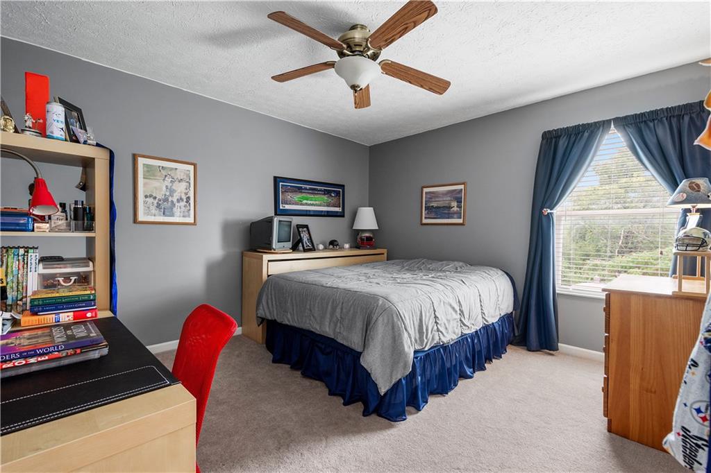 136 Maclaine Drive Carnegie, PA 15106 - Photo 26 of 30 a bedroom with a bed and a window