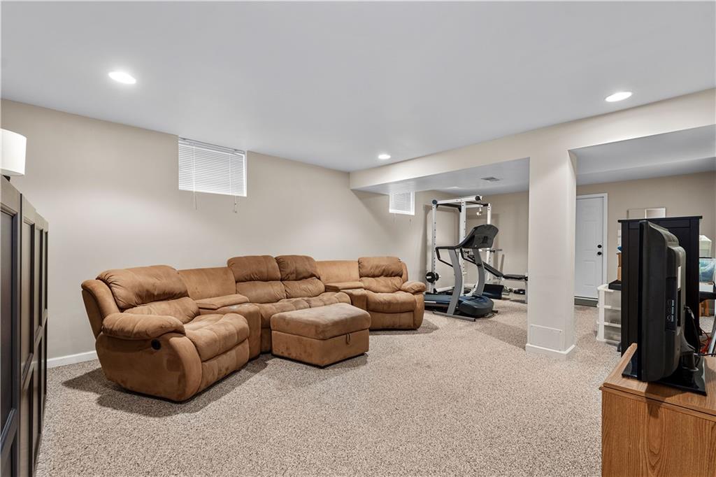 136 Maclaine Drive Carnegie, PA 15106 - Photo 27 of 30 a living room with furniture and a flat screen tv
